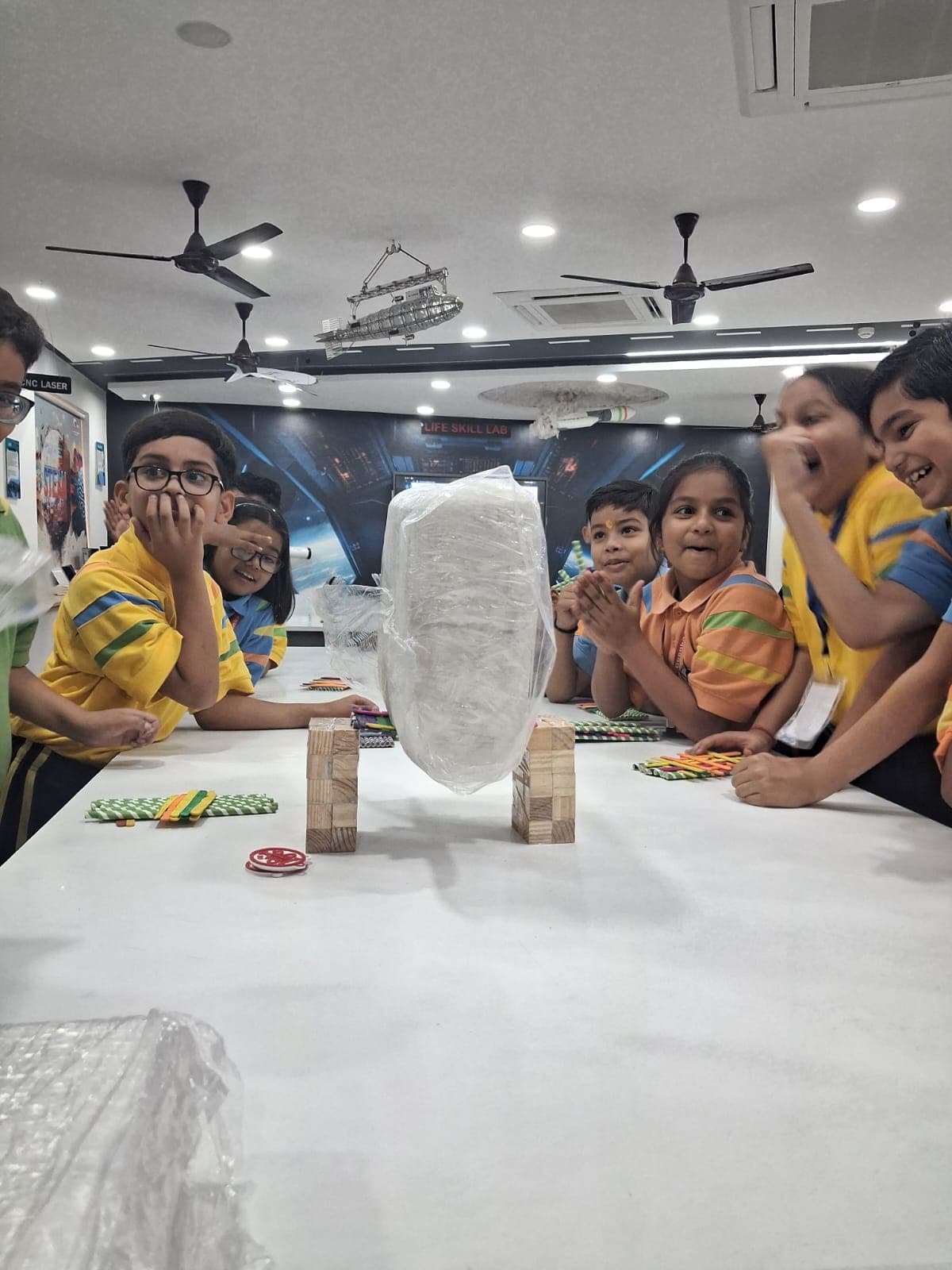 Students reacting as a build comes together in an Alforaa Skill Lab
